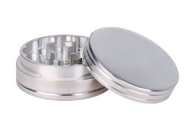 This standard 2 piece grinder is made from hardy aluminum and features a magnetic top for secure closure. These grinders measure 2 inches in diameter.